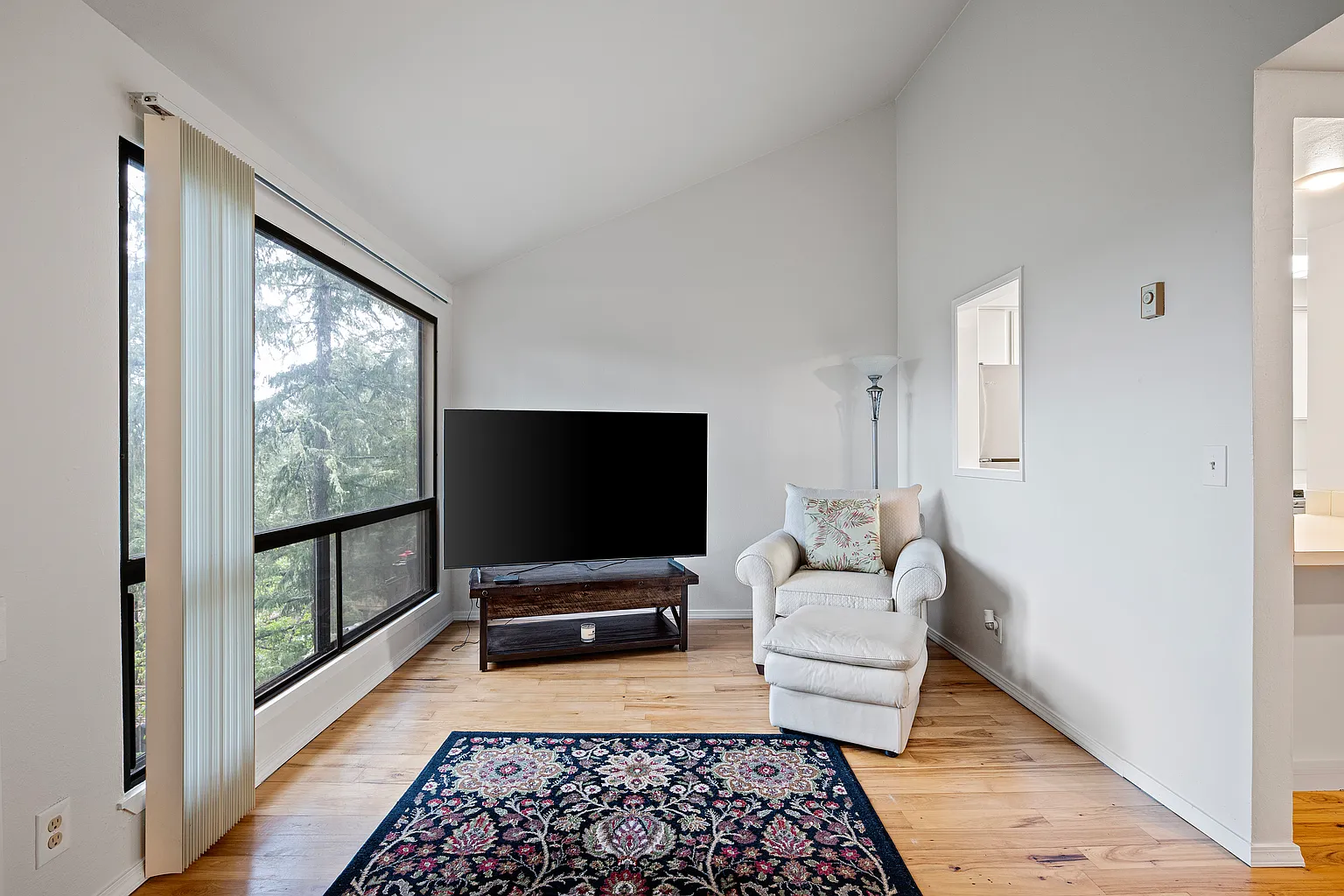Rare corner condo offering privacy, natural light, and peaceful territorial views