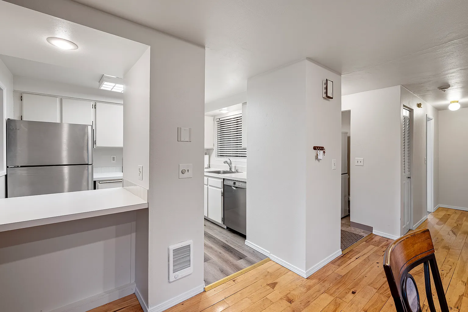 Rare corner condo offering privacy, natural light, and peaceful territorial views