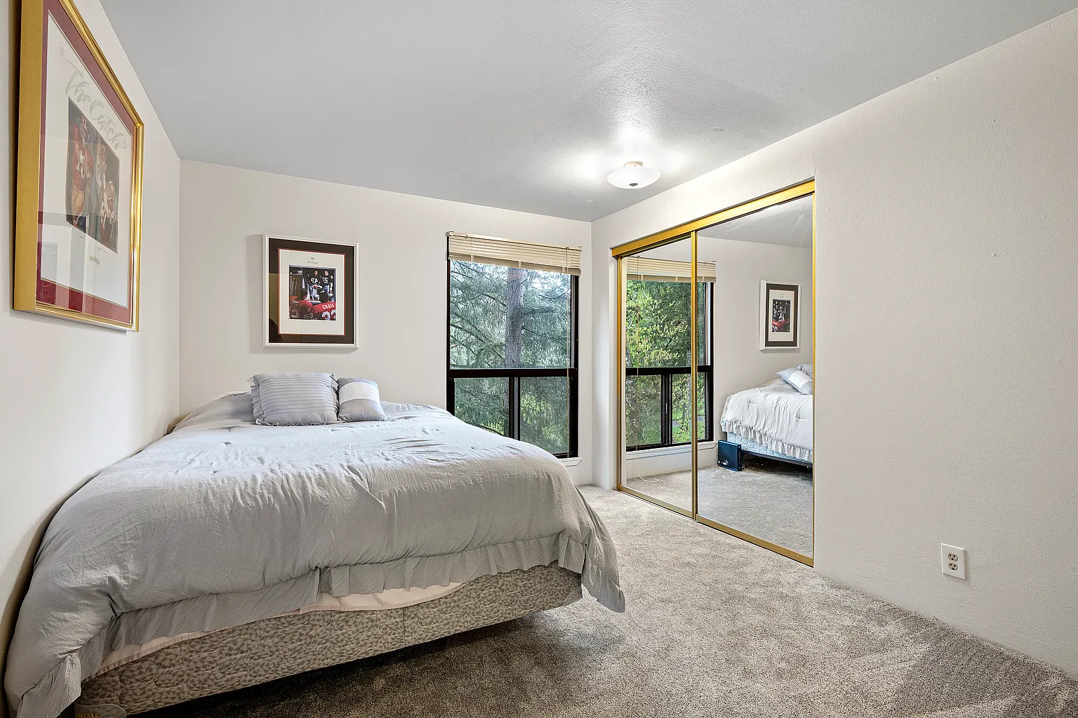 Rare corner condo offering privacy, natural light, and peaceful territorial views