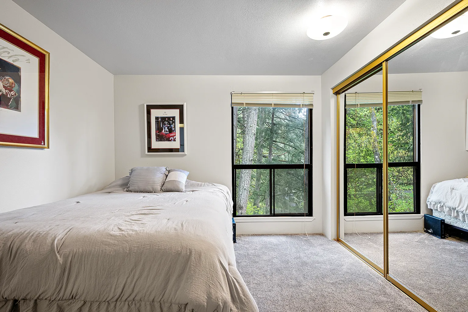 Rare corner condo offering privacy, natural light, and peaceful territorial views