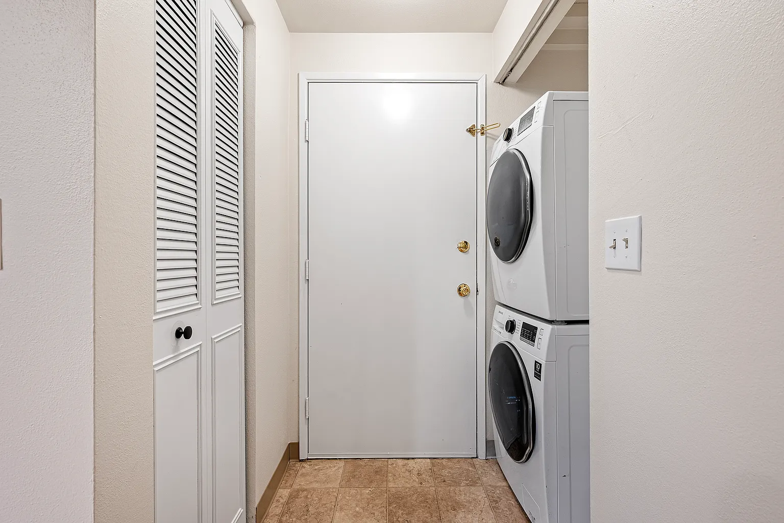 Rare corner condo offering privacy, natural light, and peaceful territorial views