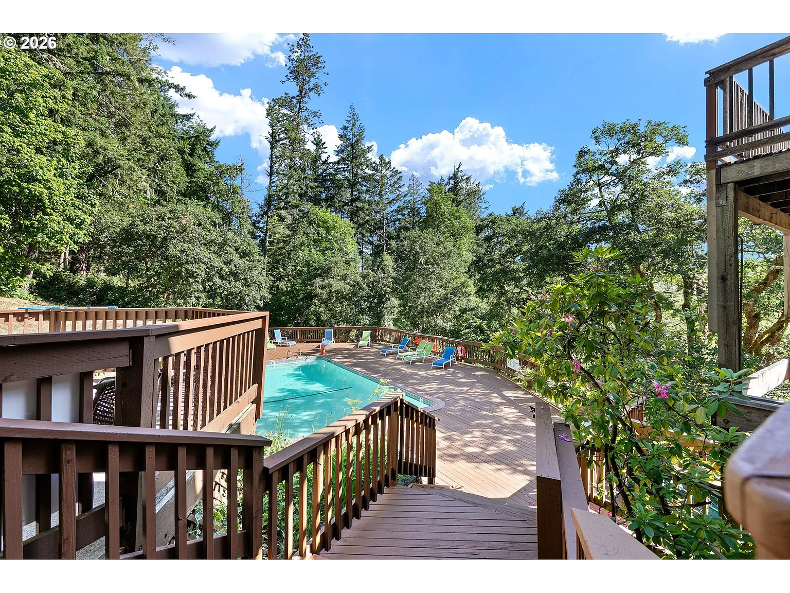 Rare corner condo offering privacy, natural light, and peaceful territorial views